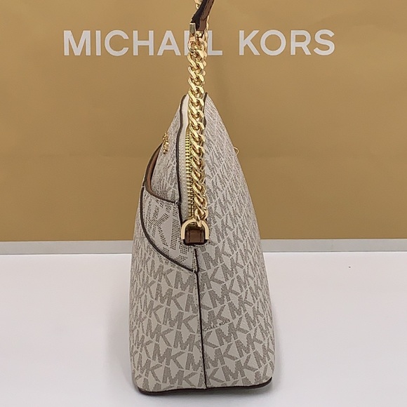 Michael Kors Medium Dome Xcross Xbody Bag
Color: Vanilla Multi - Picture 16 of 16